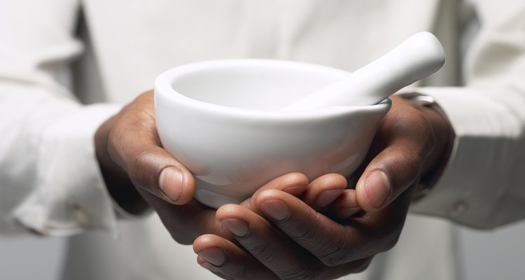 Man holding a mortar and pestle