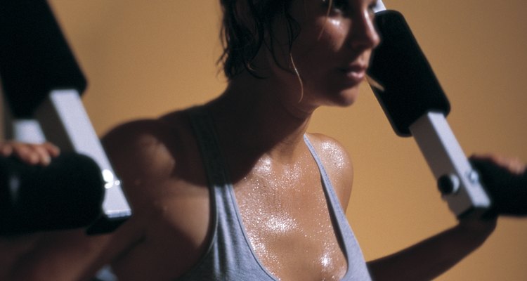 Woman working out on equipment