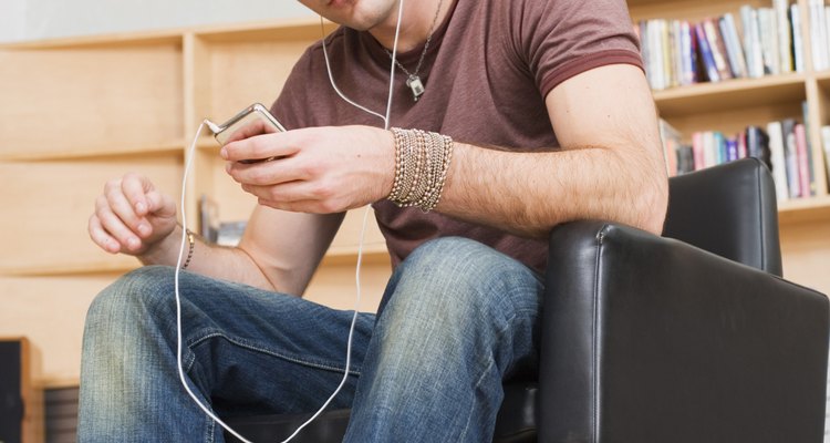 Man listening to MP3 player