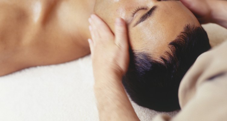 Young man lying in beauty parlour, elevated view