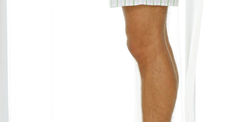 Man in boxers standing on scale