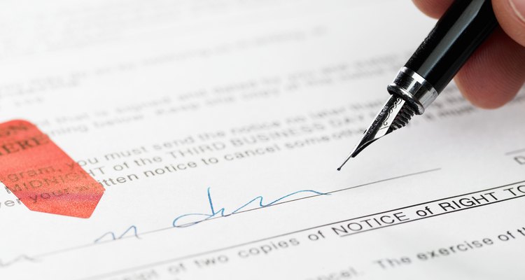 Man signing document, close-up