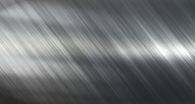 Background or texture of dark brushed steel plate