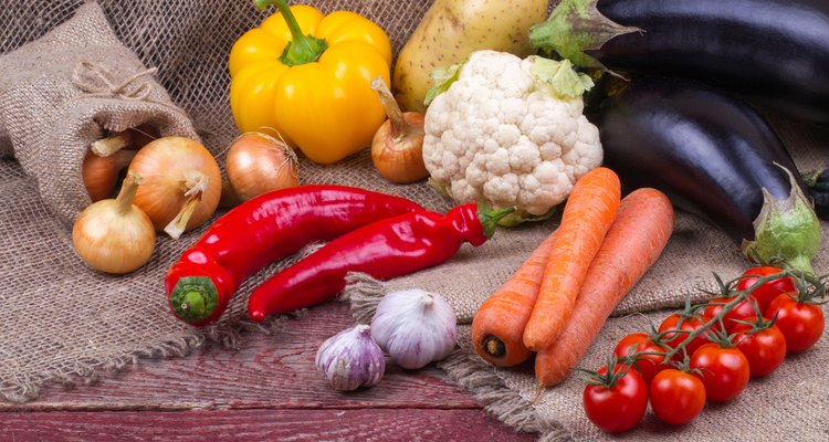 Raw vegetables on a wooden table
