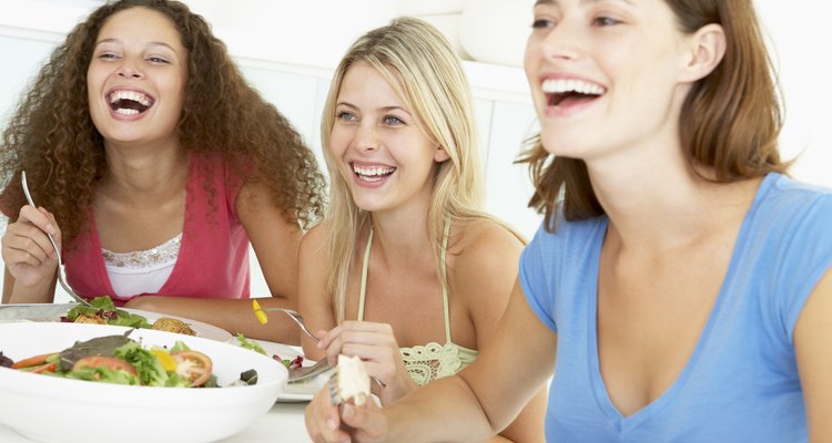 Friends Having Lunch Together At Home