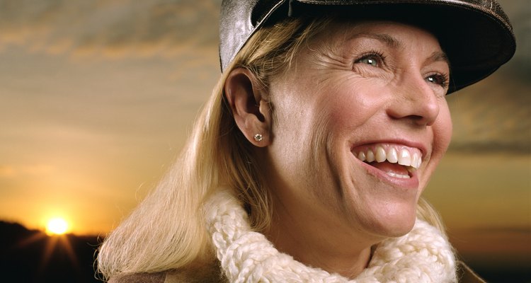 Woman smiling, looking away, portrait