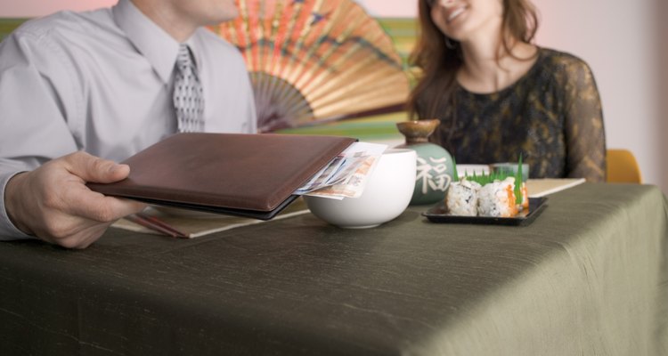 Man paying at restaurant