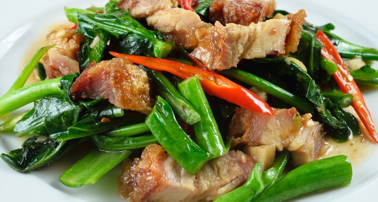 fried chinese broccoli   with crispy pork