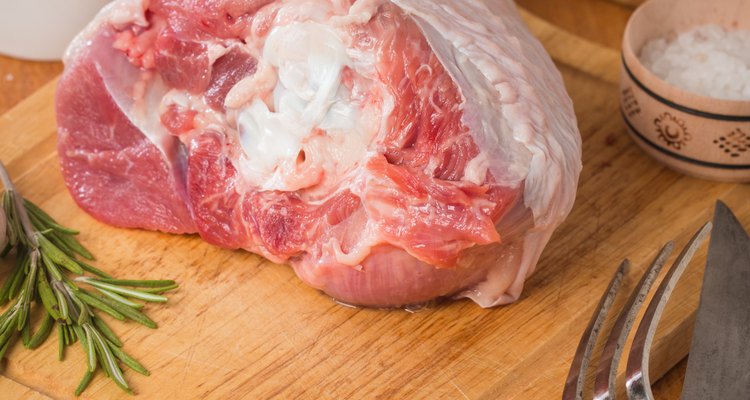 Raw turkey thigh with spices
