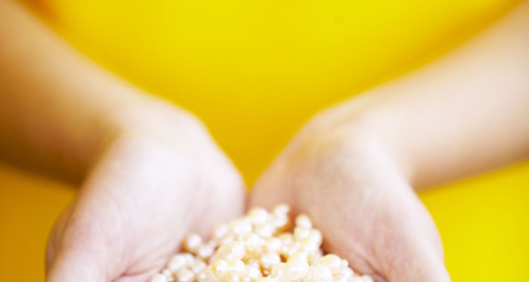 Hands holding crispy rice