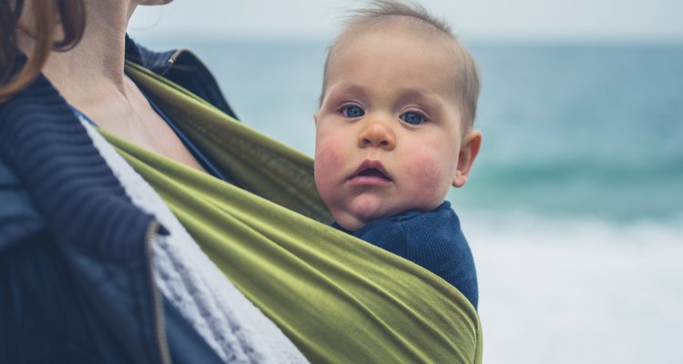 Mother with baby on the beach